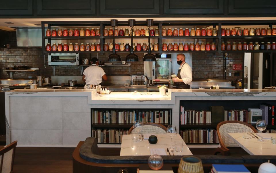 Staff works in the kitchen at Fleeting as they prepare to open inside the Thompson Savannah.