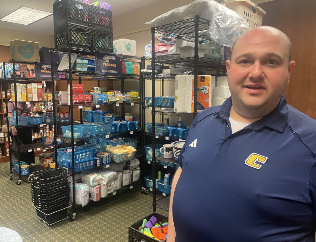 Brett Fuchs, associate dean of students at the University of Tennessee-Chattanooga, in the school's food pantry. (Photo: Submitted)