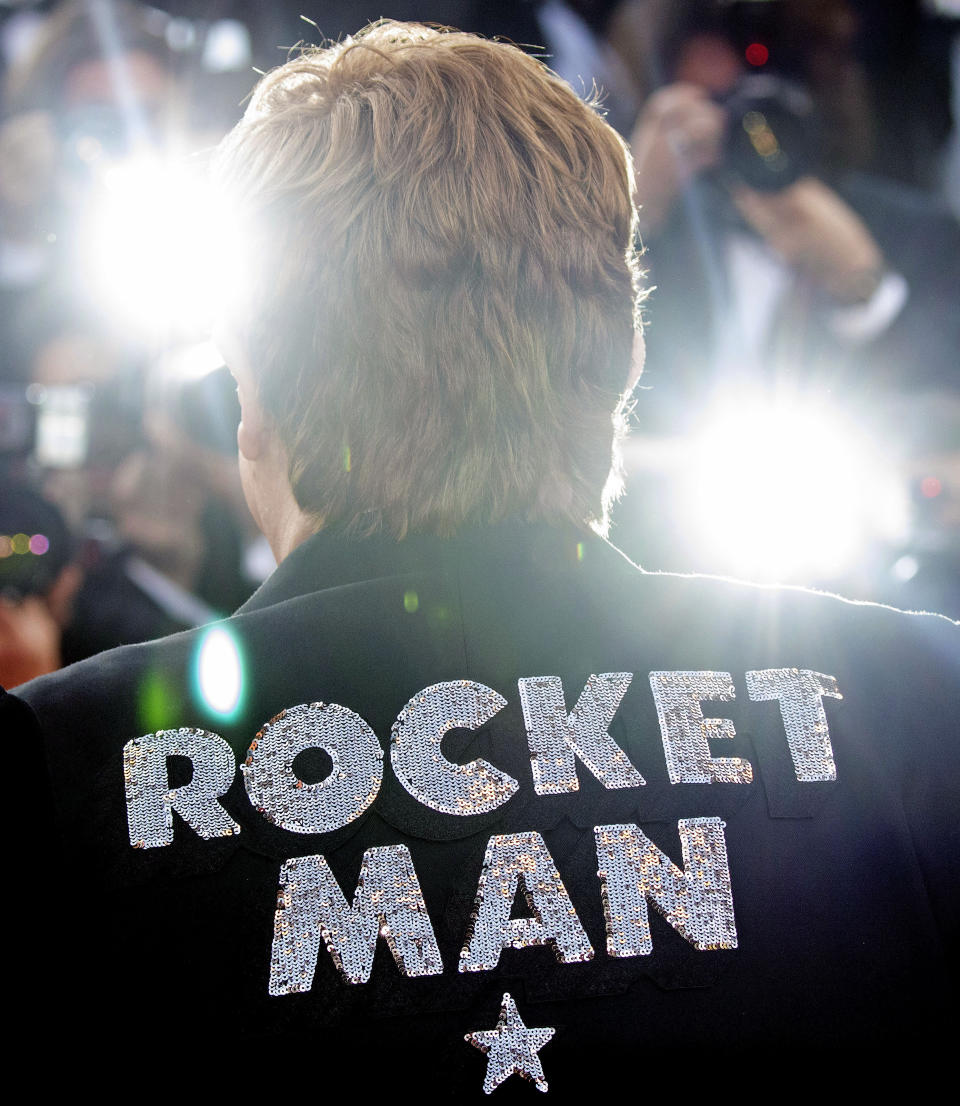 Musician Elton John poses for photographers upon his arrival at the premiere of the film 'Rocketman' at the 72nd international film festival, Cannes, southern France, Thursday, May 16, 2019. (Photo by Vianney Le Caer/Invision/AP)