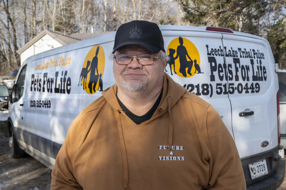 Rick Haaland of Bena, Minn., poses for a portrait on Sunday, Nov. 21, 2021. Haaland is the Community Outreach Manager for the Leech Lake Tribal Police. He and his fellow Ojibwe community members have been leading efforts to care for animals, something centrally important to Native American spiritual beliefs and traditions. (AP Photo/Jack Rendulich)