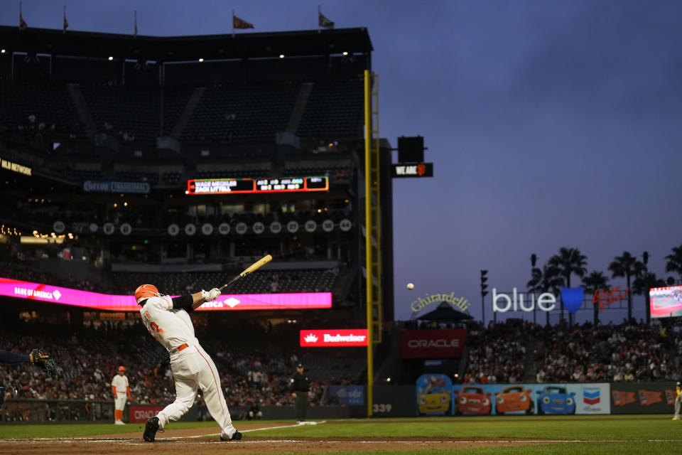 San Francisco Giants' Wade Meckler hits a single against the Tampa Bay Rays during the sixth inning of a baseball game in San Francisco, Tuesday, Aug. 15, 2023. (AP Photo/Jeff Chiu)