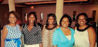 Christine Pleasant-Fite is shown second from left with friend Robbie Franklin, sister Debrah Trent and friends Melanie Rosengard and Lynette Green Jones, from left.