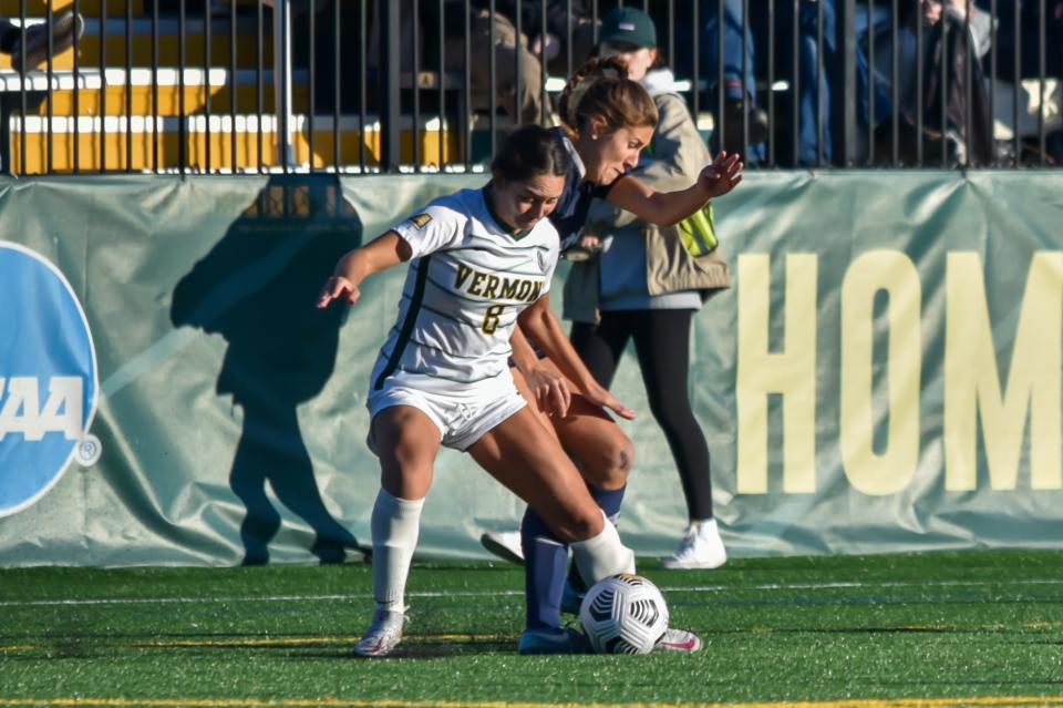 UVM's Alyssa Oviedo battles for possession during the 2021 America East Women's Soccer Championship between the UNH Wildcats and UVM Catamounts at UVM's Virtue Field.