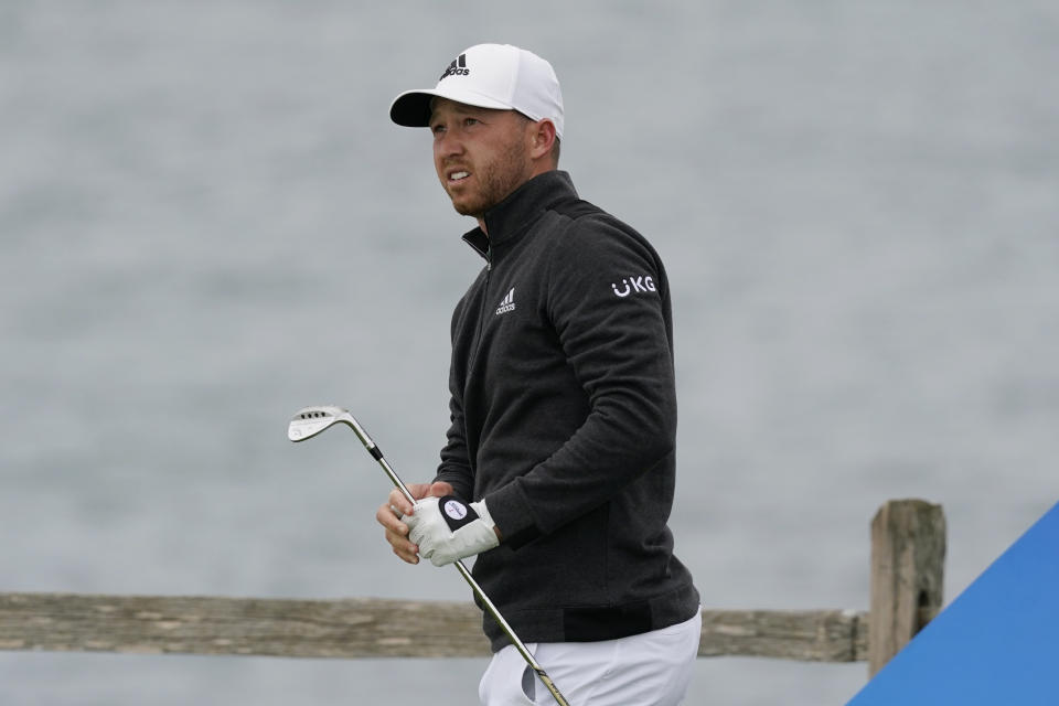 Daniel Berger follows his shot from the seventh tee of the Pebble Beach Golf Links during the final round of the AT&T Pebble Beach Pro-Am golf tournament Sunday, Feb. 14, 2021, in Pebble Beach, Calif. (AP Photo/Eric Risberg)