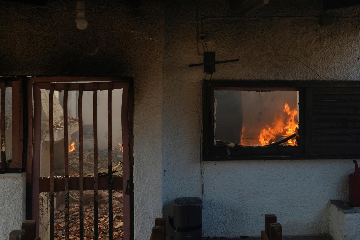 One of the houses hit by the wildfire in Loutraki (AP)