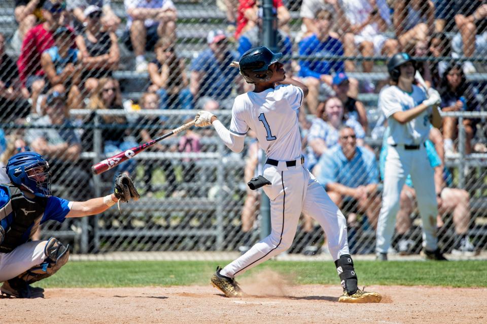 Saint Joseph's Jayce Lee hits walk off home run during the Marian-Saint Joseph high school 3A sectional baseball game on Saturday, May 28, 2022, at Clay High School - Jim Reinebold Field in South Bend, Indiana.