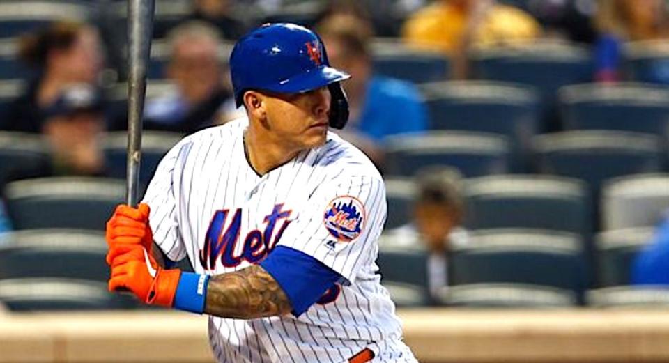 Wilson Ramos, pictured hitting in a previous Mets home game, got quite a surprise on Thursday night during the game. (Photo: Adam Hunger via Getty Images)