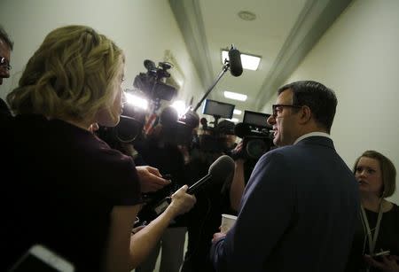 House Freedom Caucus member Rep. Justin Amash (R-MI) talks to reporters after a trip to the White House to meet with President Donald Trump about the AHCA health care bill in Washington, U.S., March 23, 2017. REUTERS/Jonathan Ernst