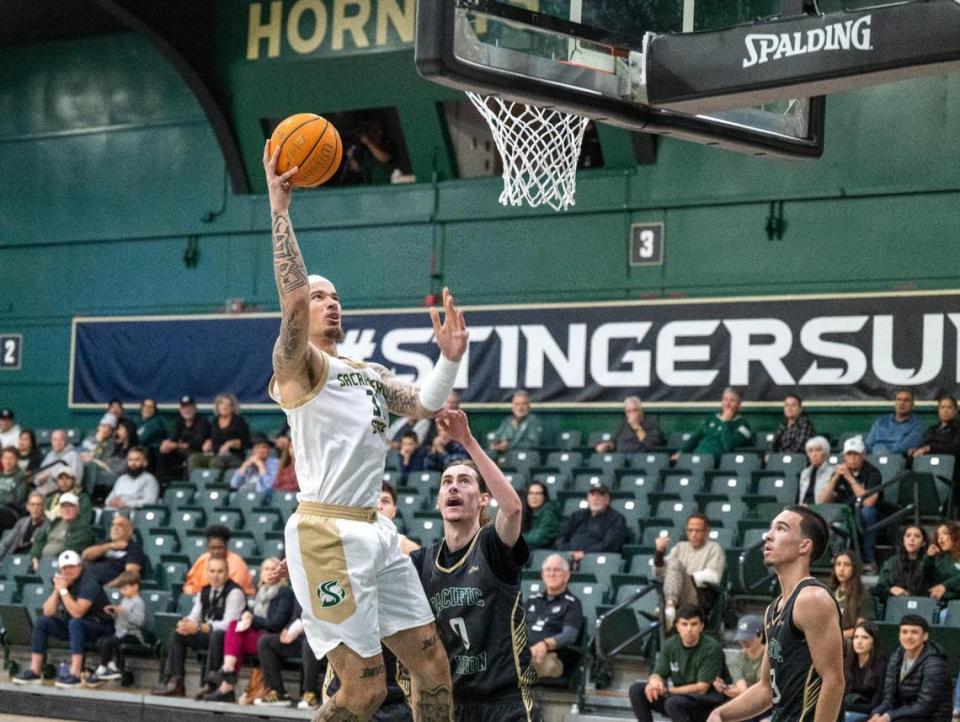 Sacramento State’s Duncan Powell goes up for a shot Tuesday in his team’s first game of the season against the Pacific Union Pioneers.