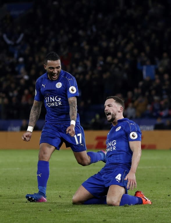 Leicester City's midfielder Danny Drinkwater (R) celebrates scoring with defender Danny Simpson at King Power Stadium in Leicester, central England on February 27, 2017