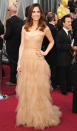 Kristen Wigg arrives at the 84th Annual Academy Awards in Hollywood, CA.