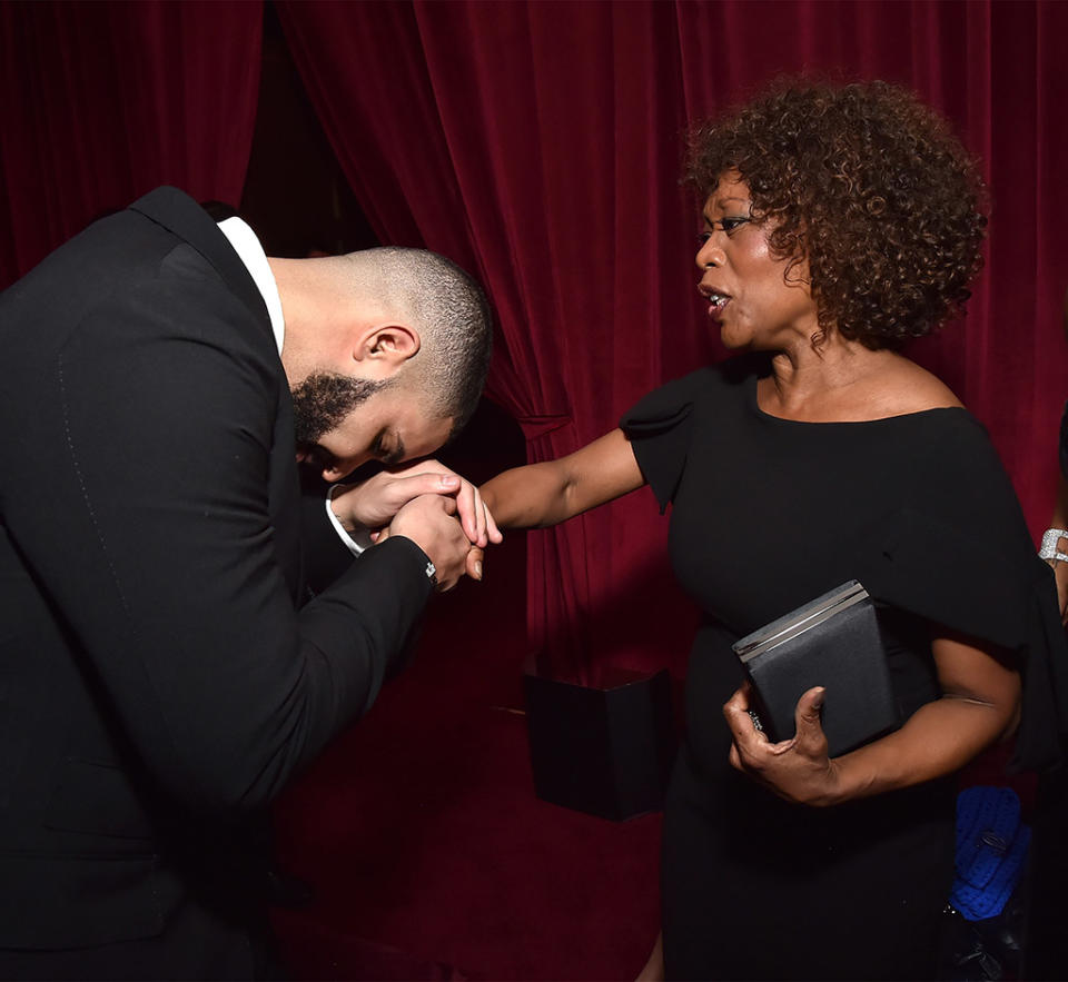 <p>Kiss the ring! Drake bowed down to Alfre Woodard during the Netflix Golden Globes party. (Photo: Kevin Mazur/Getty Images for Netflix) </p>