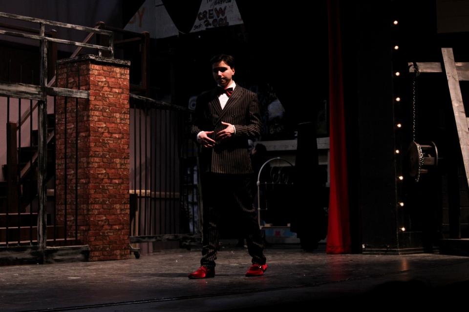 Dean Williams as Gomez wrestles with being trapped between his wife and his daughter in Westlake's production of "The Addams Family."