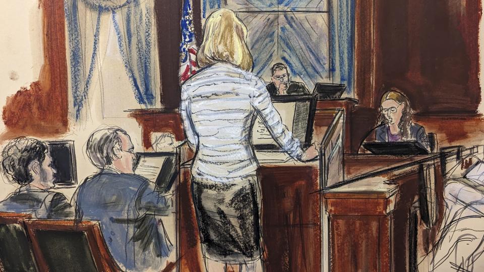 In this courtroom sketch, Caroline Ellison, right, testifies as she is questioned by Assistant U.S. Attorney Danielle Sassoon as FTX co-founder Sam Bankman-Fried, far left, looks on in Manhattan federal court, Tuesday, Oct. 10, 2023, in New York. Ellison, the former fellow top executive and ex-girlfriend of Sam Bankman-Fried, began testifying against him, immediately blaming her former boyfriend for directing her to commit crimes before his cryptocurrency empire collapsed last November. (Elizabeth Williams via AP)