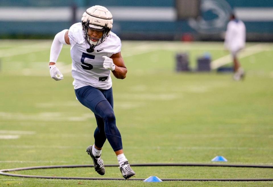 Penn State wide receiver Mitchell Tinsley runs a drill during the first day of practice on Monday, Aug. 1, 2022.