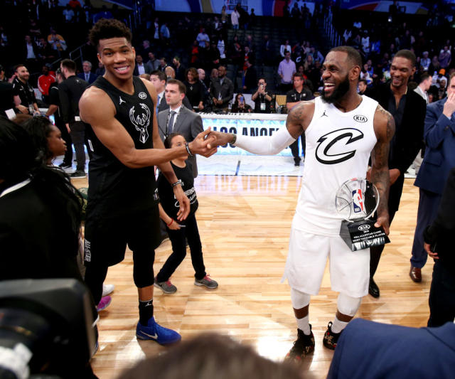 LeBron the brightest star among stars at Lakers home debut