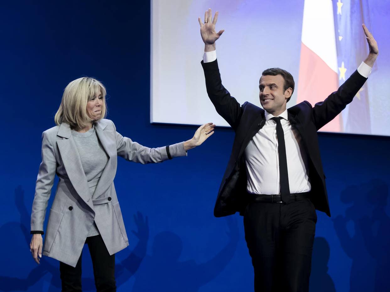 Emmanuel Macron with his wife Brigitte Trogneux addresses activists after the announcement of the French presidential election results: Getty