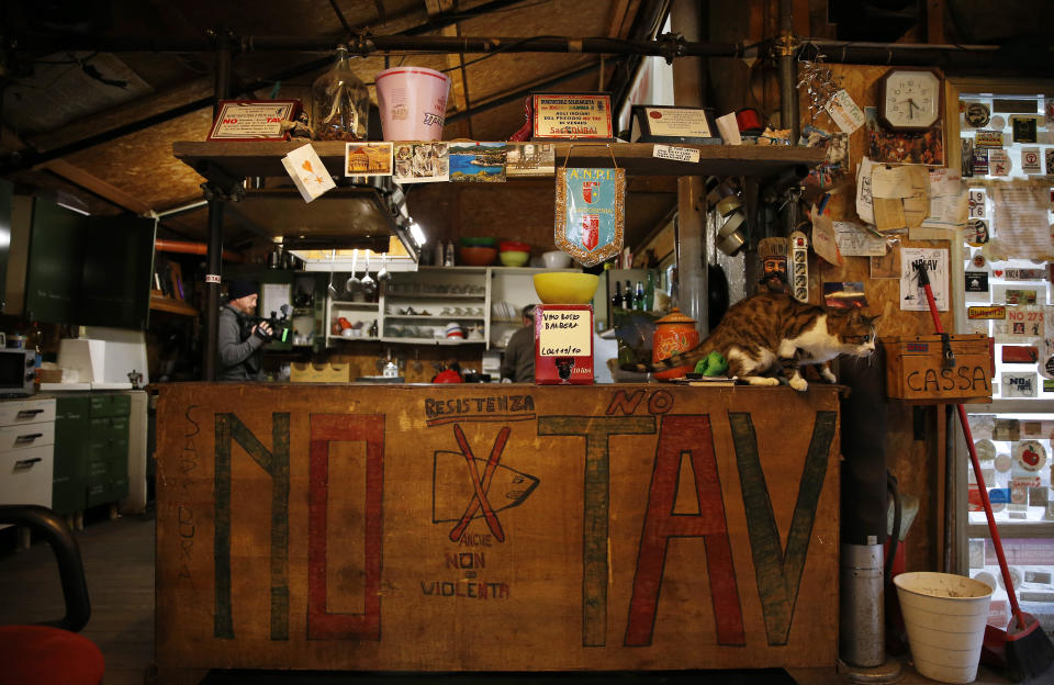 A view of the No-TAV movement headquarters in Venaus, northern Italy, Tuesday, Feb. 12, 2019. The TAV project is part of a European wide network to improve high-speed rail connections. On the Italian side, the construction site long targeted by sabotaging protesters is guarded by four law enforcement agencies and has been reduced to maintenance work only. The survival of Italy's increasingly uneasy populist government could very well depend on whether Italy restarts construction on the TAV link, which it halted in June. (AP Photo/Antonio Calanni)