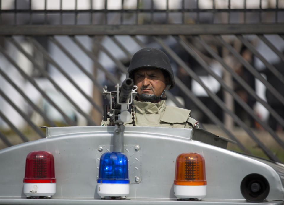 A Pakistani paramilitary soldier guards a special court set up for the trial of former President Pervez Musharraf in Islamabad, Pakistan, Friday, March 14, 2014. Court trying the country’s former military ruler Musharraf for treason has asked police to arrest him if he fails to attend the next court hearing on March 31. (AP Photo/B.K. Bangash)