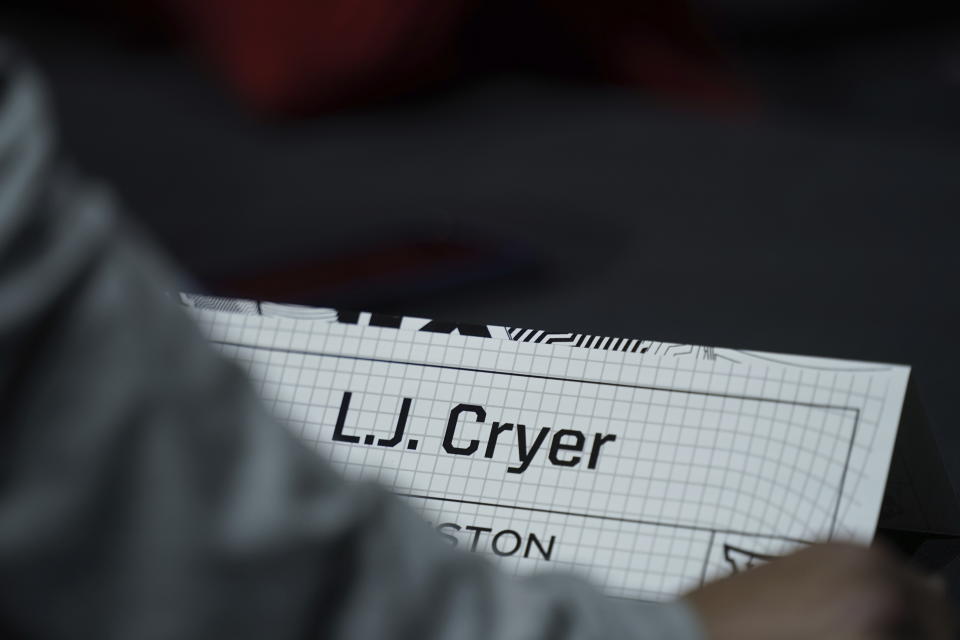 Houston's L.J. Cryer talks to the media during the NCAA college Big 12 men's basketball media day Wednesday, Oct. 18, 2023, in Kansas City, Mo. (AP Photo/Charlie Riedel)