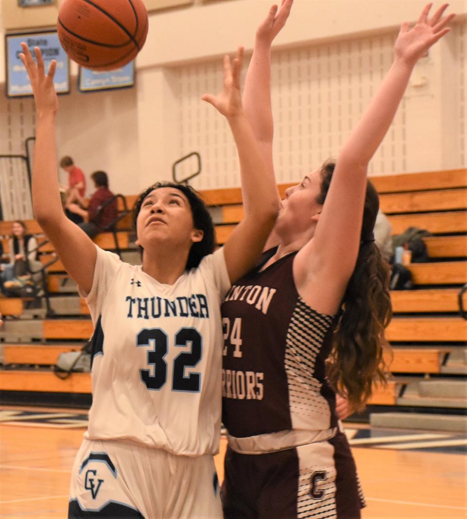 Central Valley Academy's Izzy Terzioski (32) reaches for the ball in front of Clinton defender Allie Doggett during the second half of Saturday's game .