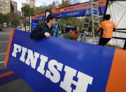Workers assemble the finish line for the New York City Marathon in New York's Central Park, Thursday, Nov. 1, 2012. The 43rd New York City Marathon is on Sunday, with many logistical questions to be answered. (AP Photo/Richard Drew)Workers assemble the finish line for the New York City Marathon in New York's Central Park, Thursday, Nov. 1, 2012. The New York City Marathon is on Sunday, with many logistical questions to be answered. (AP Photo/Richard Drew)
