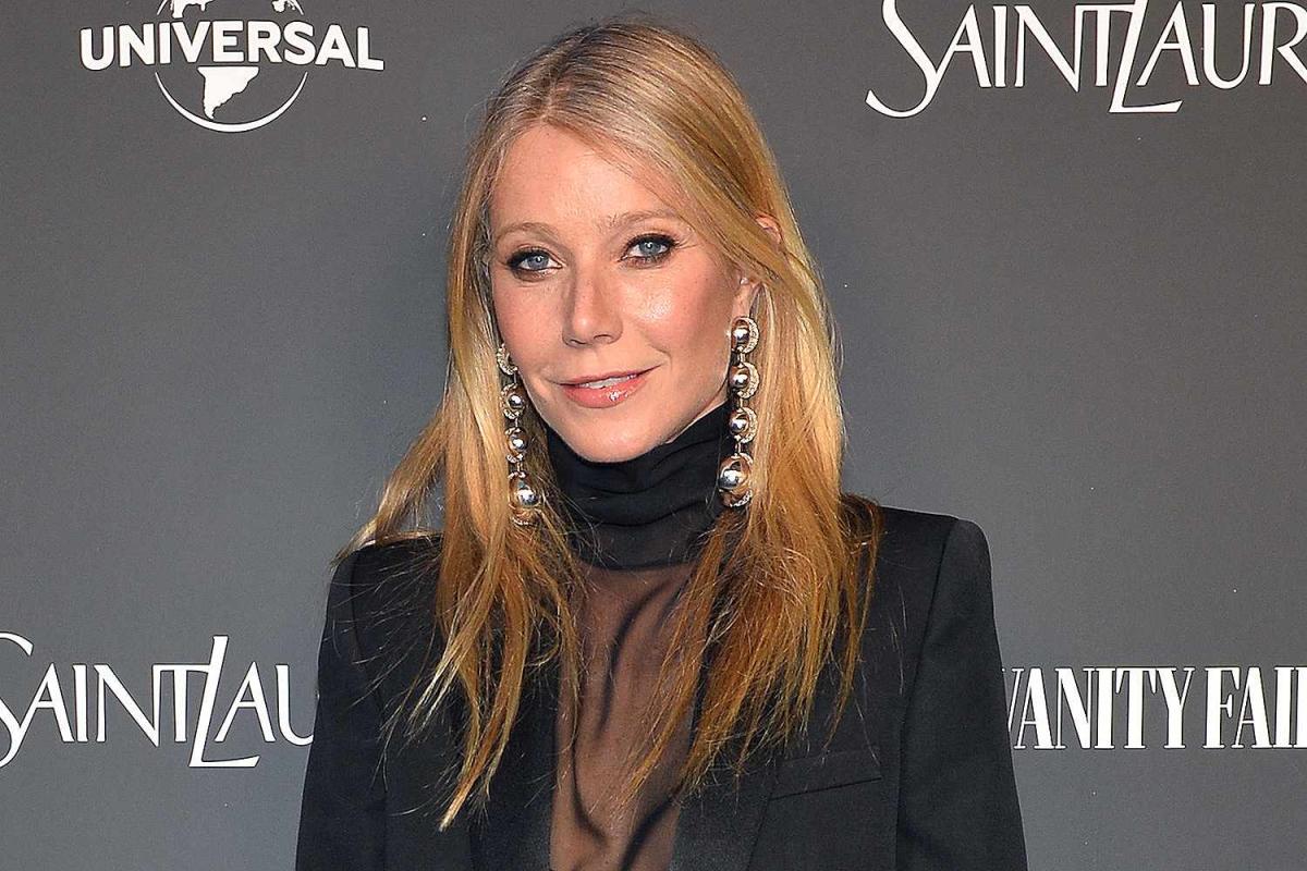 Gwyneth Paltrow Pairs Mesh Shirt with Black Blazer at Saint