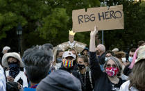 People gather at Washington Square Park in New York Saturday, Sept. 19, 2020, a day after the death of Justice Ruth Bader Ginsburg. (AP Photo/Craig Ruttle)