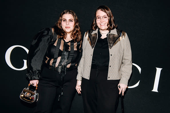 Beanie Feldstein and Bonnie Chance Roberts in stylish outfits at a Gucci event