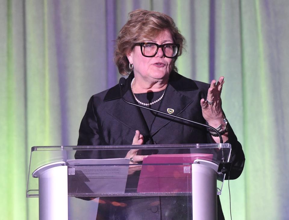 Virginia Kleist, dean of Wayne State University's Mike Ilitch School of Business, speaks at the business school's 2022 recognition and awards program Nov. 10, 2022, at The Roostertail in Detroit.