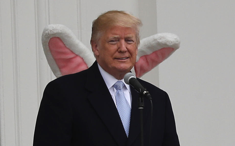 <p>U.S. President Donald Trump appears on the South Portico of the White House with the Easter Bunny standing behind him as the annual White House Easter Egg Roll is held on the South Lawn of the White House in Washington, U.S., April 2, 2018. (Photo: Carlos Barria/Reuters) </p>