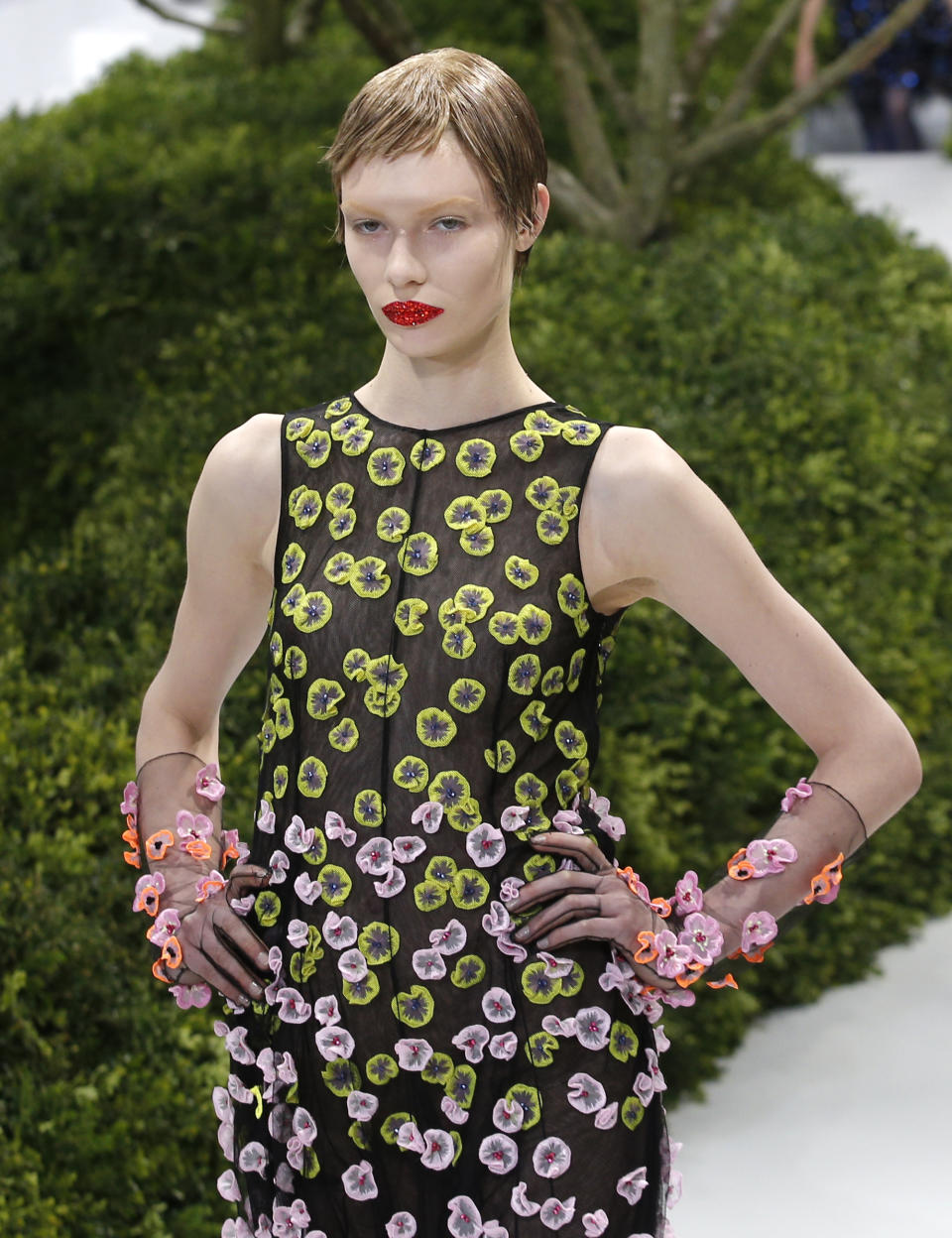 A model presents a creation by Raf Simons for Christian Dior's Spring Summer 2013 Haute Couture fashion collection, presented in Paris, Monday, Jan.21, 2013. (AP Photo/Christophe Ena)