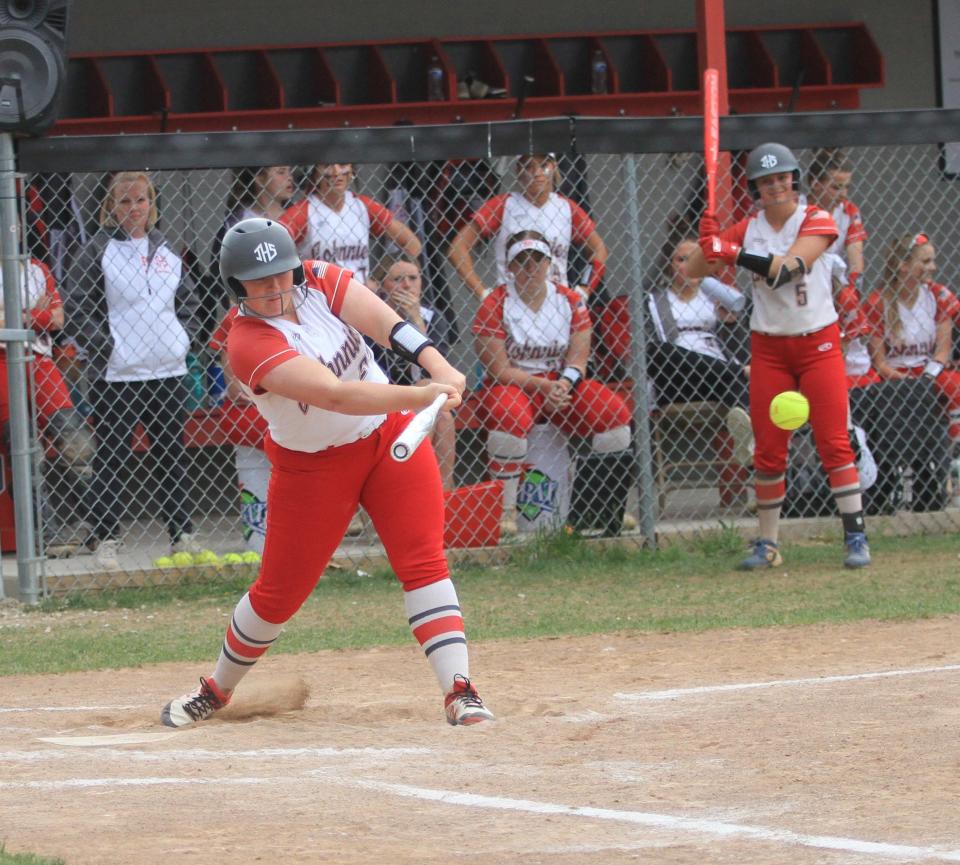 Johnstown senior Dakota Staffan hits a single against Lakewood on Friday, April 21, 2023. Staffan, who hit a two-run home run in the first inning, helped the host Johnnies to a 3-0 lead in the fourth inning when a storm suspended play.