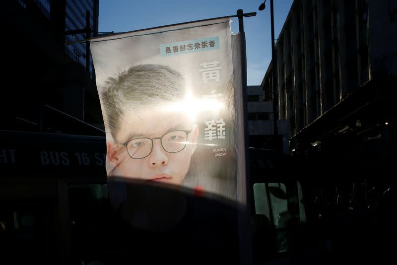 A banner showing a portrait of pro-democracy activist Joshua Wong is seen in Hong Kong