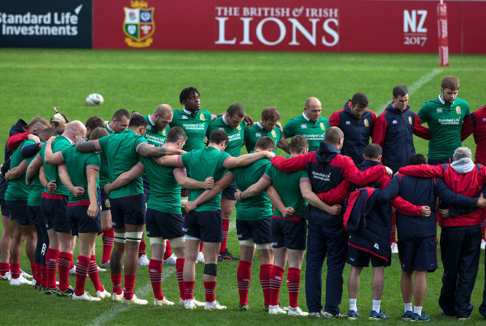 <p>British and Irish Lions squad members embrace for a moment of silence for the victims in the London terror attacks prior to a training run in Auckland, New Zealand, Tuesday, June 6, 2017. The Lions play the Auckland Blues in their second tour match at Eden park Wednesday June 7. (Photo: Brett Phibbs/New Zealand Herald via AP) </p>