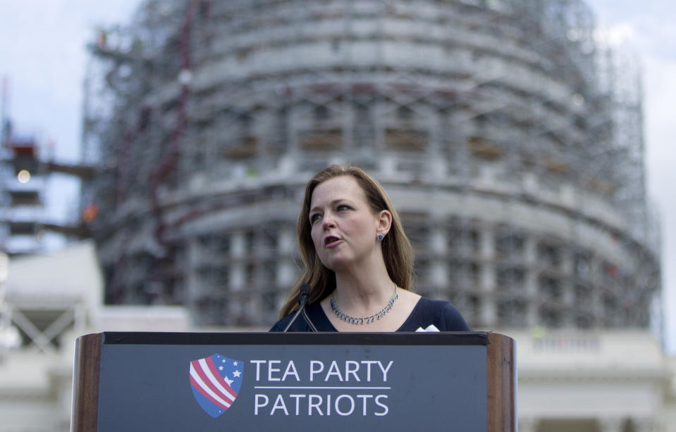 FILE - Jenny Beth Martin, president and co-founder of the Tea Party Patriots speaks during a rally organized by Tea Party Patriots on Capitol Hill in Washington, Sept. 9, 2015. Dysfunction within the Republican Party isn't limited to the leadership chaos in the House of Representatives playing out in the nation's capital. The hard-right forces that increasingly steer the direction of the GOP also have gained strength in numerous state legislatures, making it virtually impossible for the party to effectively governor even in states where it has the majority. (AP Photo/Carolyn Kaster, File)
