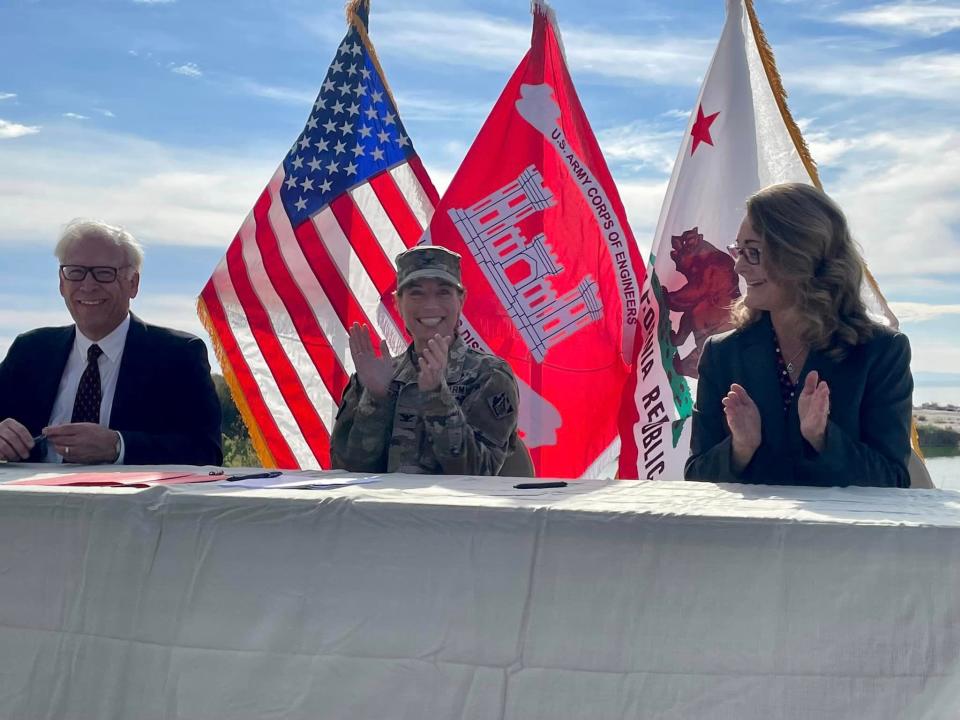 G. Patrick O’Dowd, executive director, Salton Sea Authority; Col. Julie Balten, commander of the U.S. Army Corps of Engineers’ LA District; and Cindy Messer, lead deputy director, California Department of Water Resources, celebrate after signing the Imperial Streams Salton Sea Feasibility Cost-Share Agreement during a Dec. 16 signing ceremony near the shores of the Salton Sea in Mecca, California.