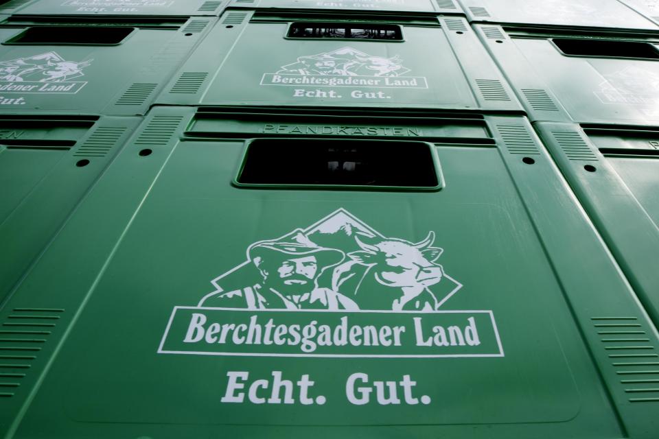 The logo of the Berchtesgadener Land dairy cooperative is pictured in Piding near Munich, Germany, Friday, July 15, 2022. The Molkerei Berchtesgadener Land has stockpiled 200,000 liters of fuel oil so it can continue to produce electricity and steam if natural gas supplies to its turbine generator are cut off. (AP Photo/Matthias Schrader)