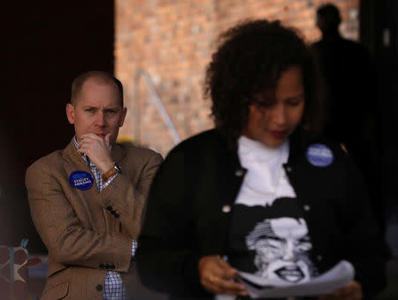 Attorney General candidate Charlie Bailey, who has been on tour with the Democratic gubernatorial candidate for Georgia, Stacey Abrams, listens at a rally in Atlanta, Georgia, U.S. October 28, 2018. REUTERS/Lawrence Bryant