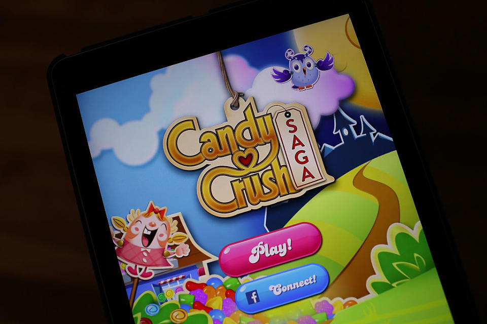 A phone screen showing "Candy Crush Saga"