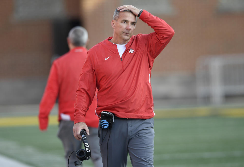 Ohio State head coach Urban Meyer looks on during a break in the Buckeyes’ win over Michigan. (AP)