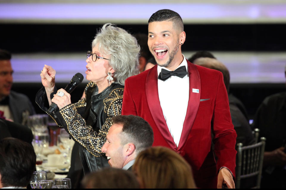 BEVERLY HILLS, CA - APRIL 12:  Actors Wilson Cruz (R) and Rita Moreno onstage during the 25th Annual GLAAD Media Awards at The Beverly Hilton Hotel on April 12, 2014 in Los Angeles, California.  (Photo by Gabriel Olsen/Getty Images)
