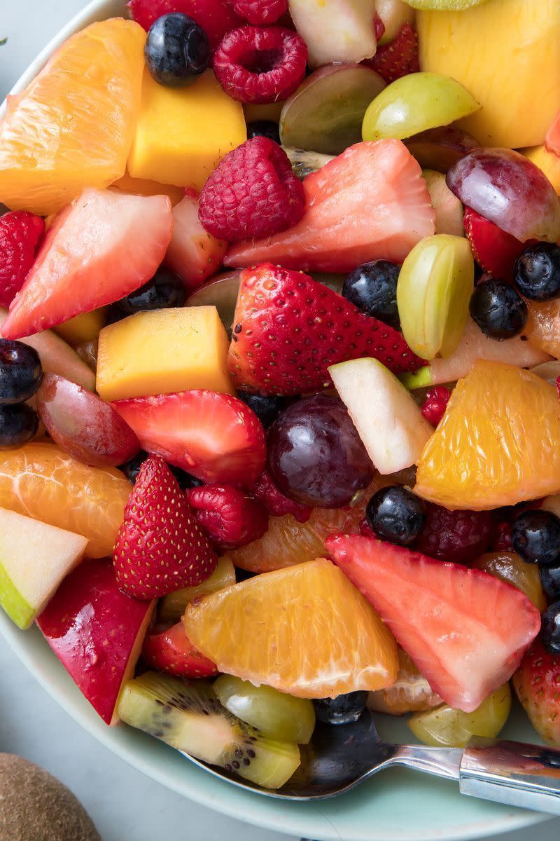 <p>Really? A recipe for fruit salad? Yes, you need it. Because this dressing takes strawberries, raspberries, and mangoes to a whole new level.</p><p>Get the <a href="https://www.delish.com/uk/cooking/recipes/a30527061/easy-fruit-salad-recipe/" rel="nofollow noopener" target="_blank" data-ylk="slk:Fruit Salad;elm:context_link;itc:0;sec:content-canvas" class="link ">Fruit Salad</a> recipe.</p>