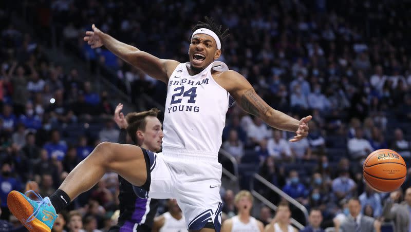 Brigham Young Cougars forward Seneca Knight (24) dunks on the Portland Pilots in Provo on Saturday, Jan. 22, 2022.