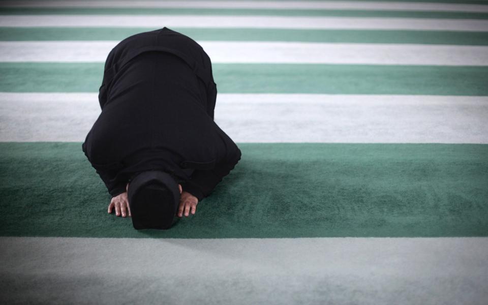 A Muslim man prays - Getty Images 