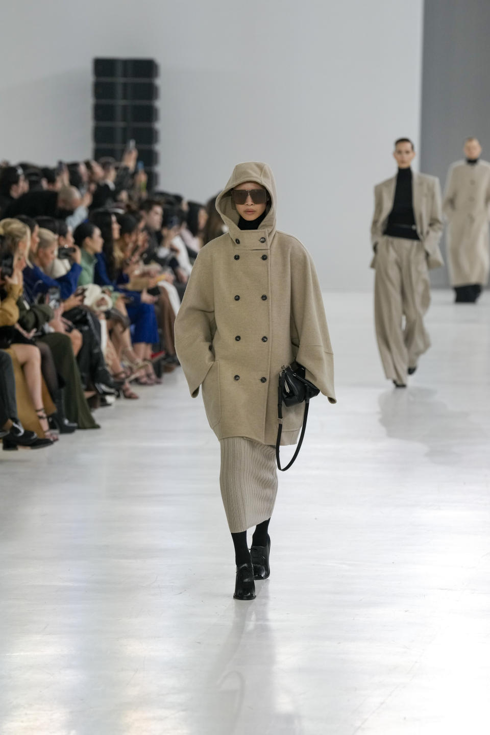 A model wears a creation as part of the Max Mara women's Fall-Winter 2024-25 collection presented in Milan, Italy, Thursday, Feb. 22, 2024. (AP Photo/Antonio Calanni)