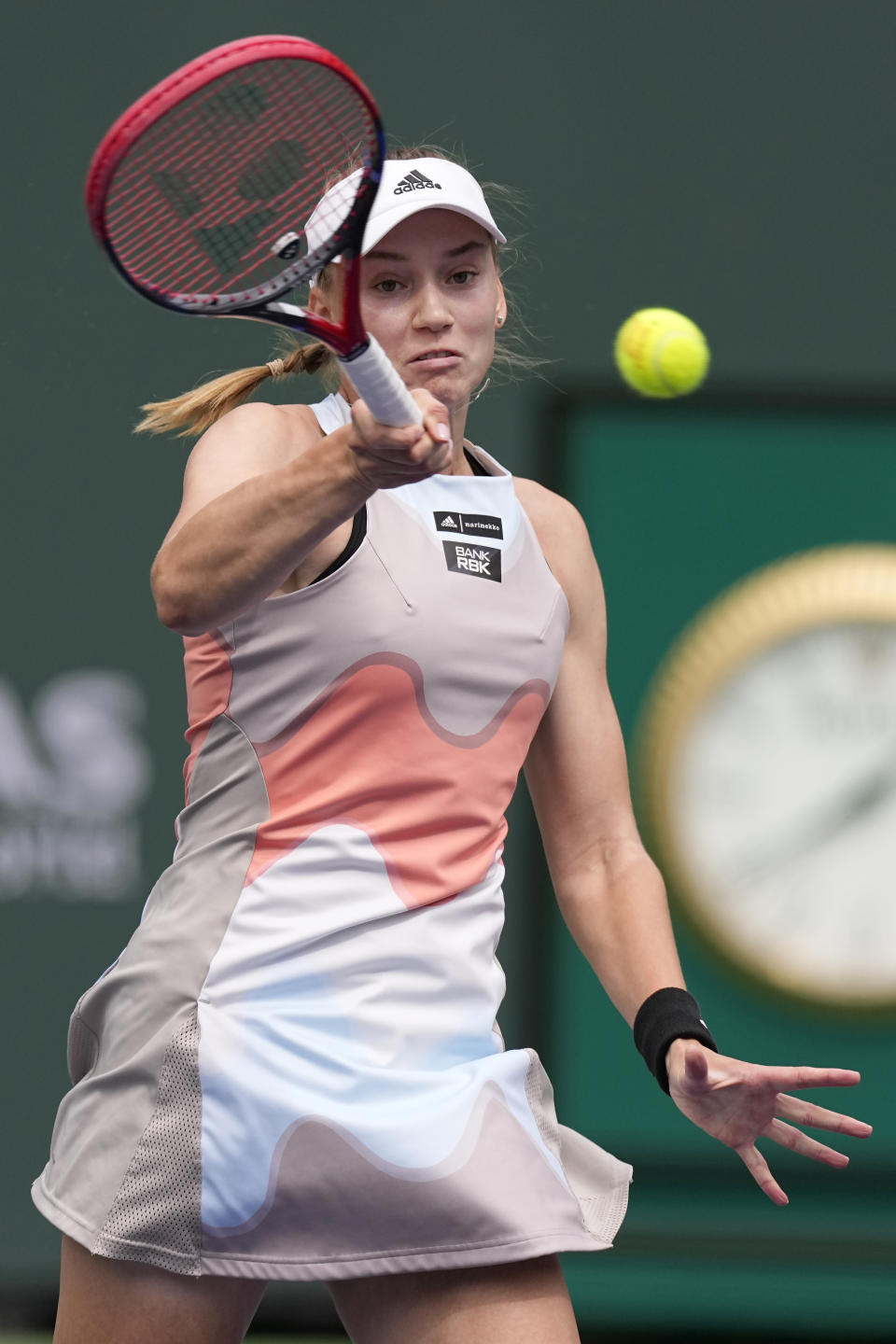 Elena Rybakina, of Kazakhstan, returns a shot against Aryna Sabalenka, of Belarus, during the women's singles final at the BNP Paribas Open tennis tournament Sunday, March 19, 2023, in Indian Wells, Calif. (AP Photo/Mark J. Terrill)