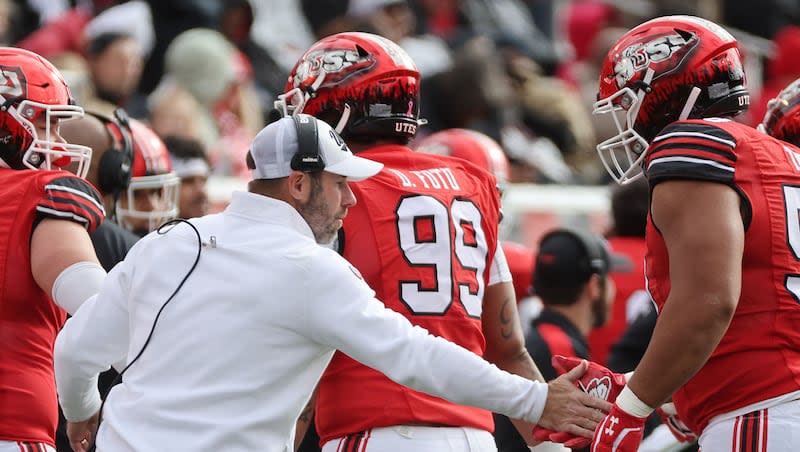 Utah Utes coach Morgan Scalley congratulates players after their game against Oregon in Salt Lake City on Saturday, Oct. 28, 2023. Oregon won 35-6.