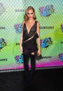 <p>Cara Delevingne, who’s been experimenting with lots of fun, different hairstyles throughout the <i>Suicide Squad </i>press tour, decided to do the same with her fashion at the premiere on Monday night. While she’s favored pants and suits for most appearances, she slipped into a silk and suede slip dress that she paired with thigh-high boots. <i>(Photo: Getty Images)</i></p>