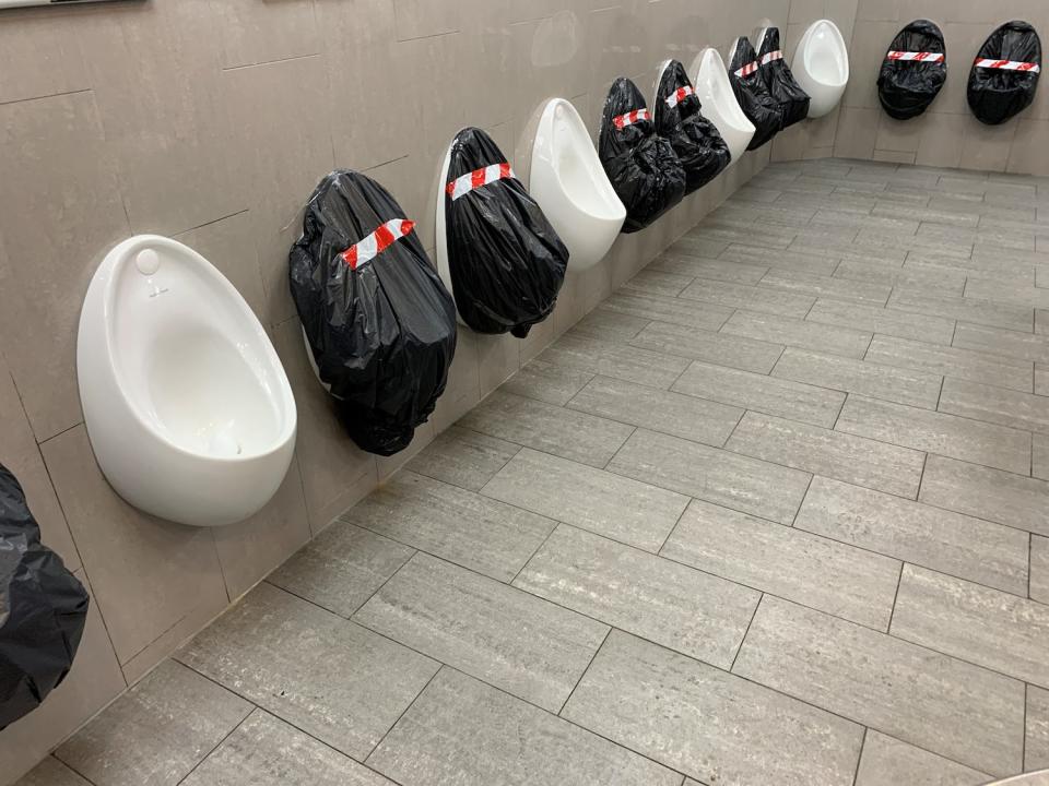 social distancing toilet urinals uk